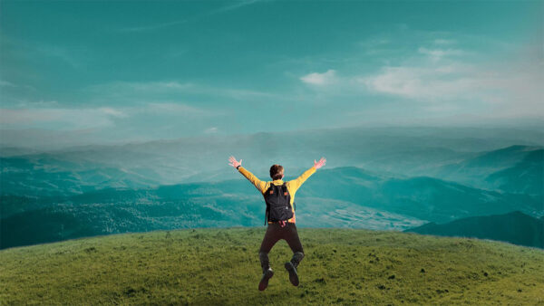 A man jumping in an open field