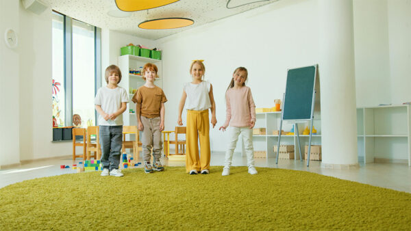 kids smiling in a classroom