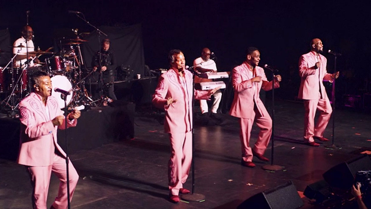 The Spinners performing on stage