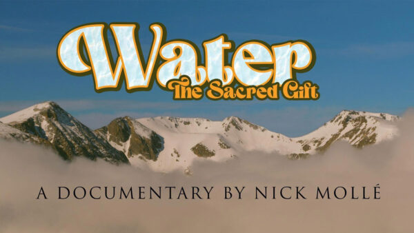 The Rocky Mountains with text reading: Water, the Sacred Gift