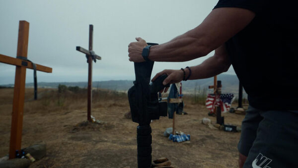 A man setting up crosses