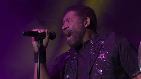The lead singer of the Commodores performing