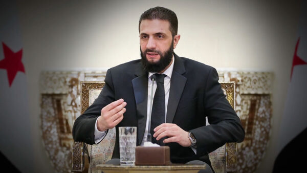 Ahmed al-Sharaa making a speech