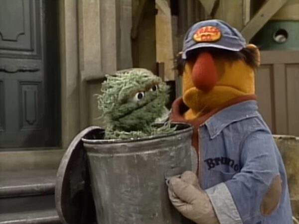 Oscar the Grouch and a garbage man