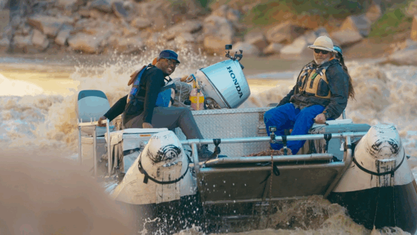 Shane Campbell-Staton and a crew on a boat