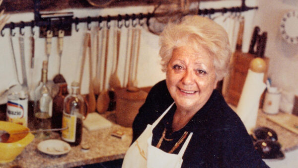 Iconic chef Marcella Hazan standing in her kitchen
