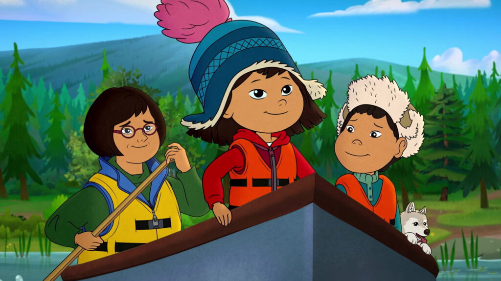 Molly of Denali, along with Tooey and Atsaq, in a boat