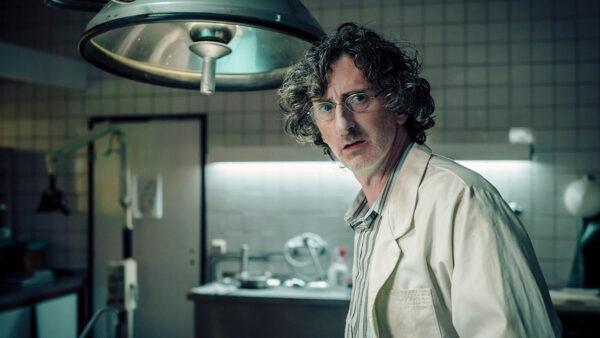 A doctor working in a morgue