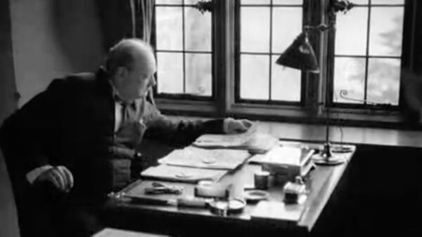 Roosevelt looking at important documents