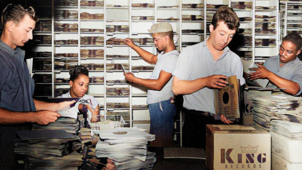 People working on records