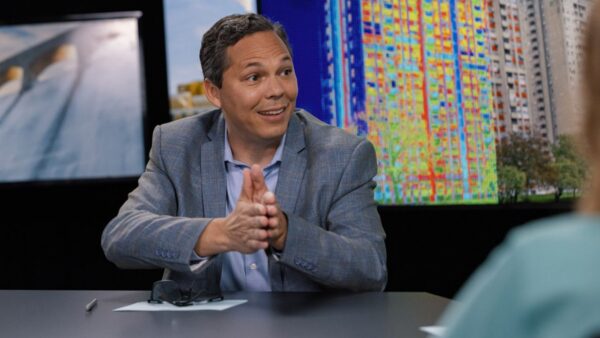 Dr. Daniel Betts speaking on innovative air conditioning ideas.