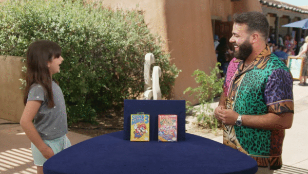 A kid showing off her vintage items