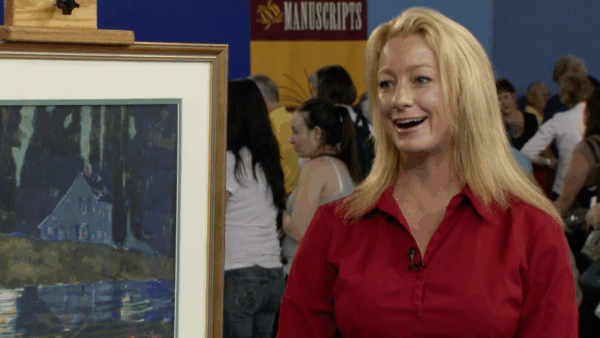 A woman standing next to a vintage painting