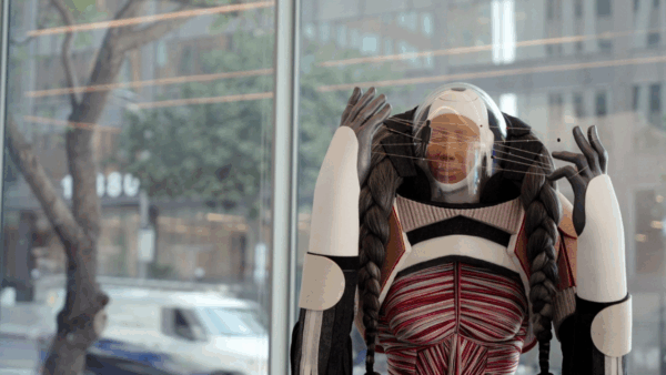A robot in front of a window
