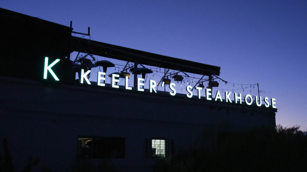 Keeler’s Neighborhood Steakhouse sign board