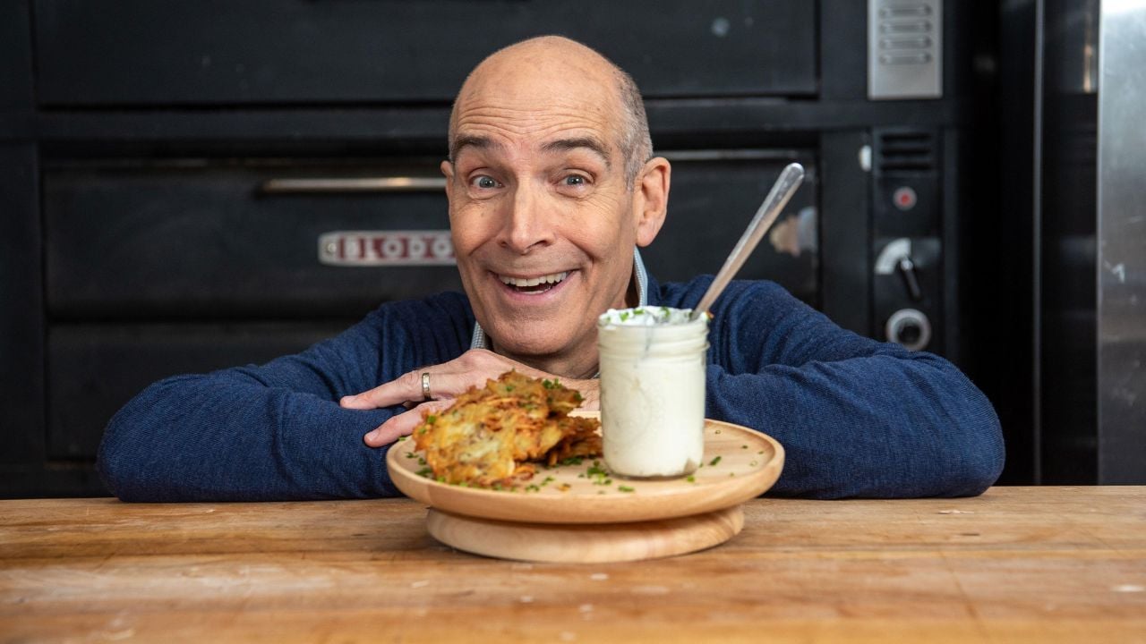 Geoffrey Baer presenting his home-cooked dish