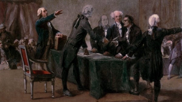 A group of historical figures stands around a table, engaged in discussion