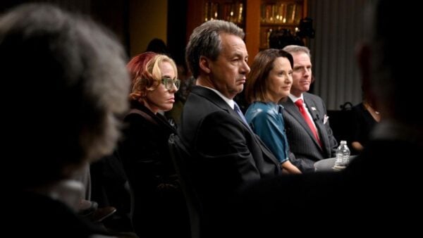 A group of experts standing together on 