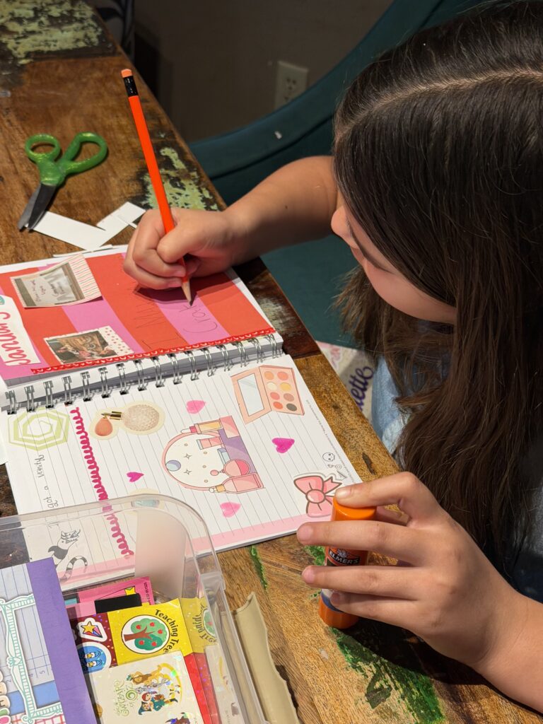 Child writing in a journal