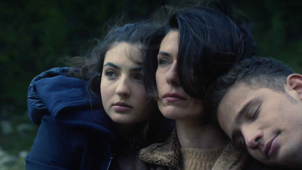 Three people leaning on eachother