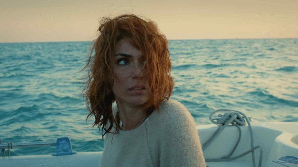 A women looking behind her on a book