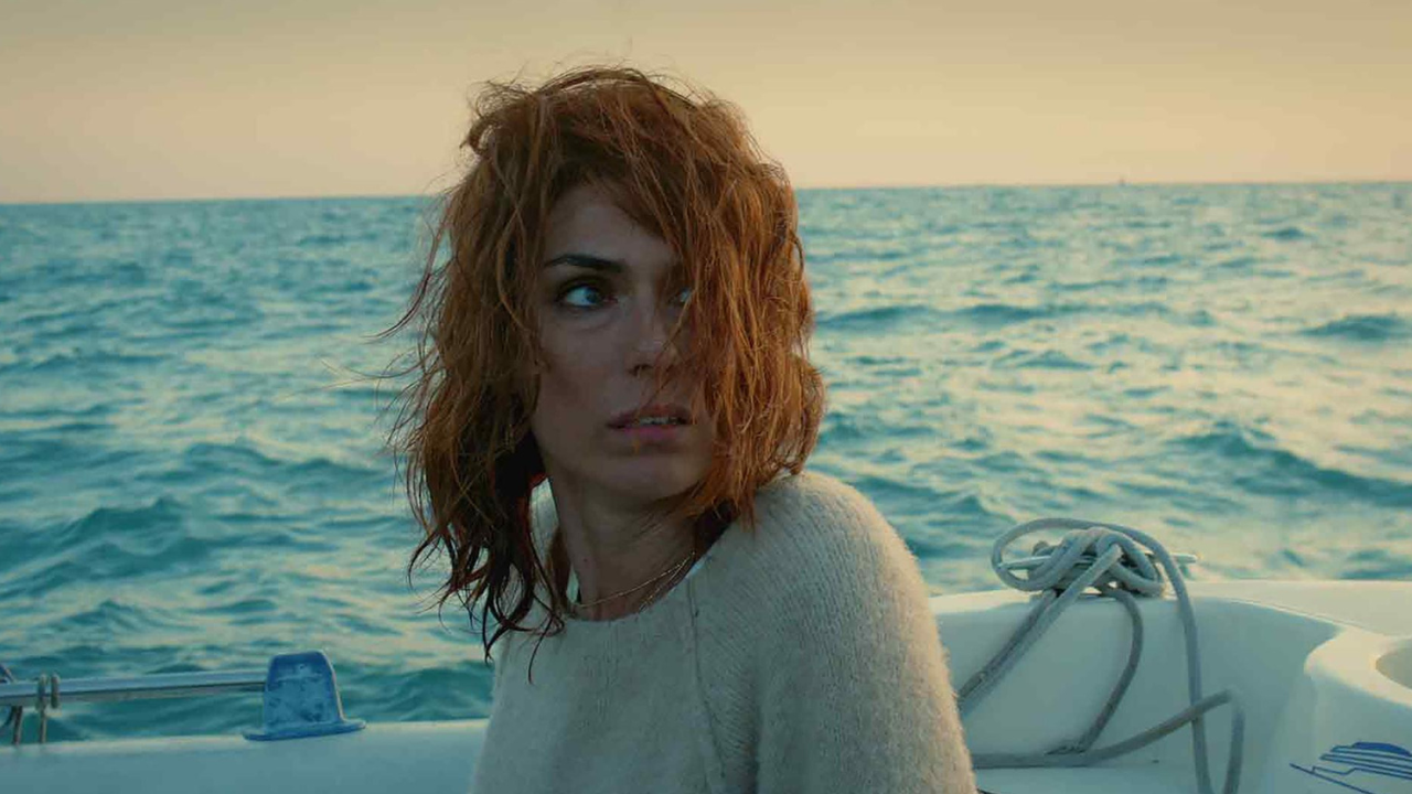 A women looking behind her on a book