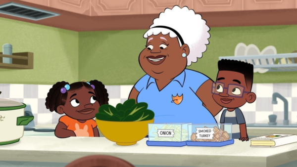 Phoebe and Jay cooking with their grandma