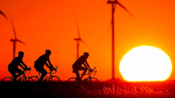 A silhouette of bikers