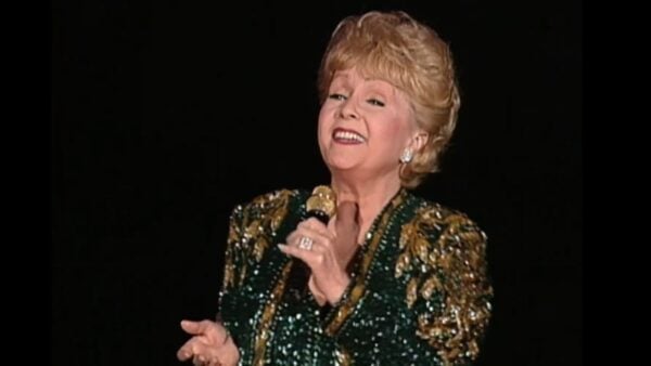 Debbie Reynolds singing on stage