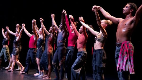 Dancers bowing on a stage