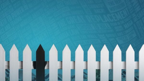 A white fence with one plank painted black