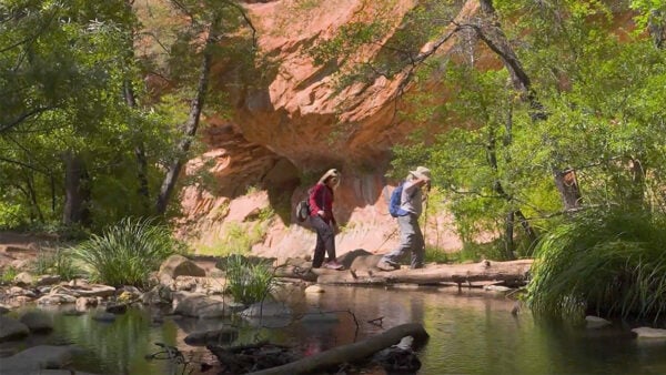 Kristen Keogh hikes through a rocky Arizona landscape
