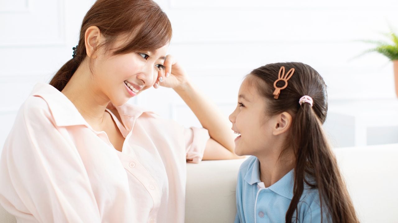 A child and mother having a conversation