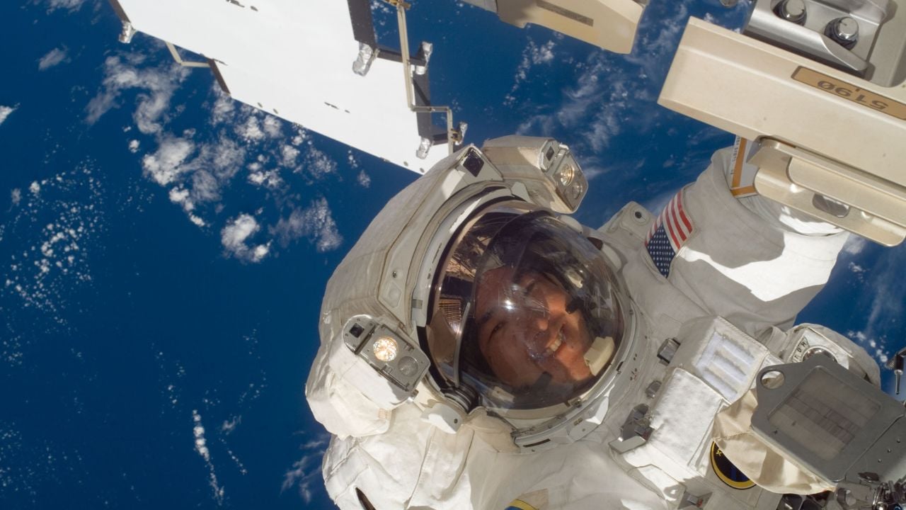 Astronaut Daniel Tani in a spacesuit