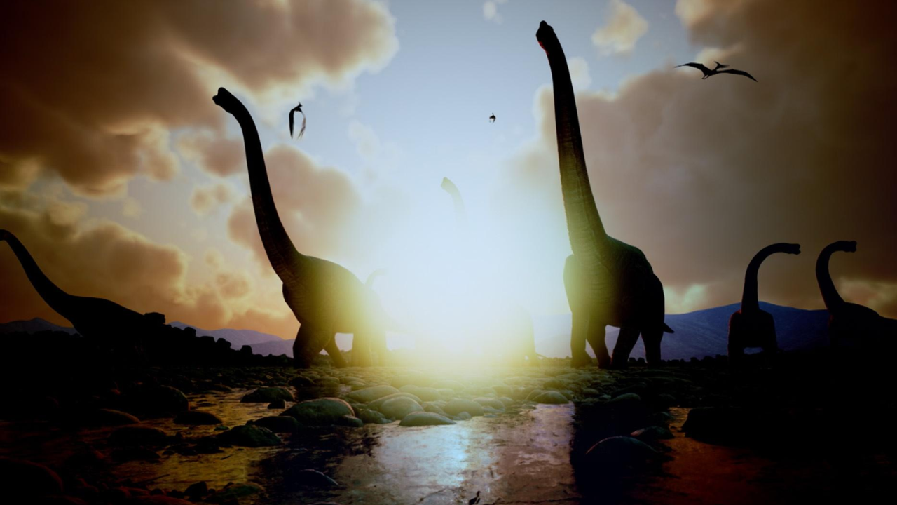 Dinosaurs walking in a group